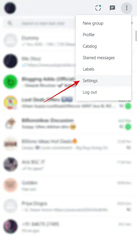 Tap on the three dots (⋮) button > Settings